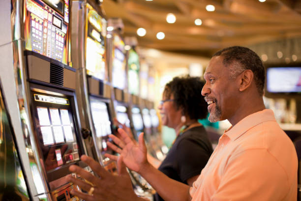 Mobile phone screen showing live roulette table and sports markets on jagoanspin